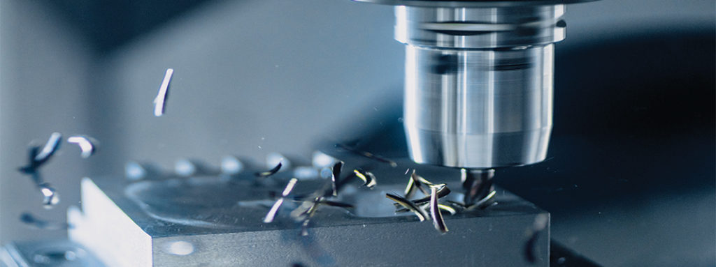 CNC milling machine cutting steel